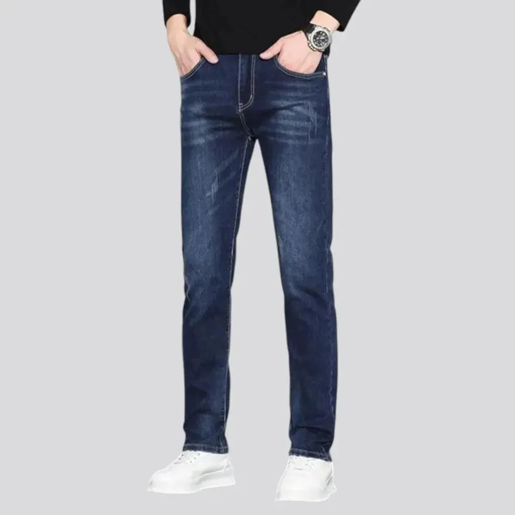 Dark slim-fitting casual men's jeans