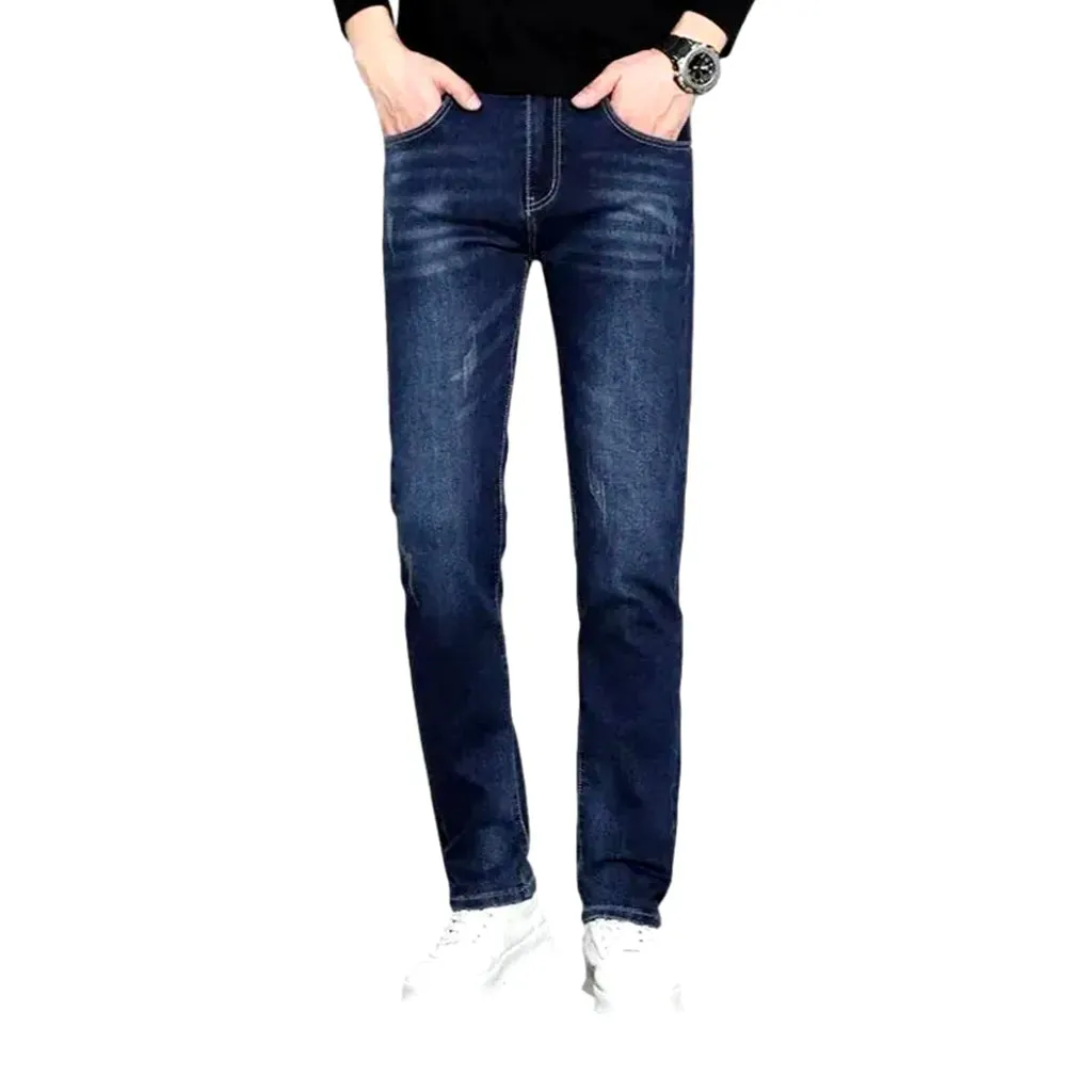 Dark slim-fitting casual men's jeans